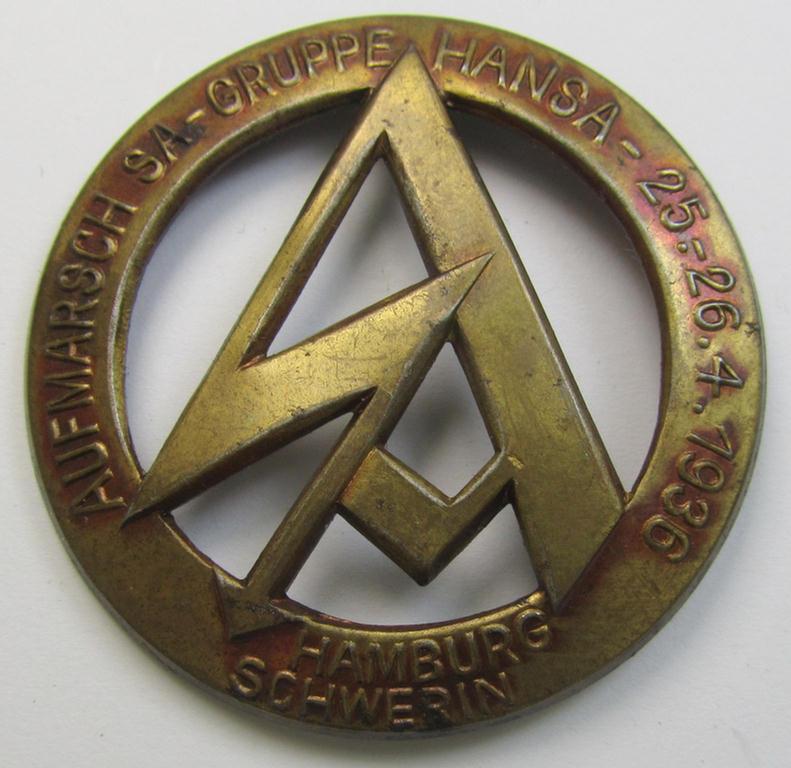 Attrative, golden-bronze-toned- (and I deem zinc-based) SA-related day-badge (ie. 'tinnie' or: 'Veranstaltungsabzeichen') as was issued to commemorate the: 'Aufmarsch SA-Gruppe Hansa - 25.26.4.1935 - Hamburg Schwerin'