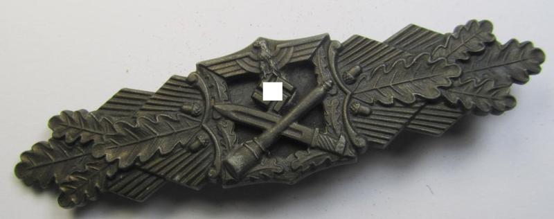 Superb, 'Nahkampfspange in Bronze' (or: bronze-class close-combat clasp ie. CCC) being a neatly maker-marked- and/or minimally converse-shaped specimen as was produced by the: 'JFS'- (ie. 'Joseph Feix u. Söhne'-) company