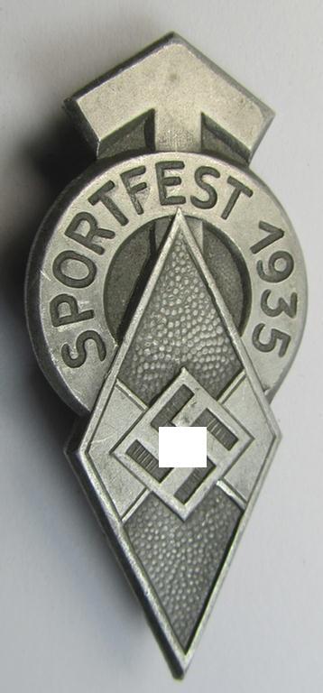 Superb, commemorative, aluminium-based- and/or: greyish-silver-coloured, 'HJ'-related 'tinnie', being a maker- (ie. 'K. Wurster'-) marked example, depicting a 'HJ-Raute' ie. 'Leistungsrune' surrounded by the text: 'Sportfest - 1935'