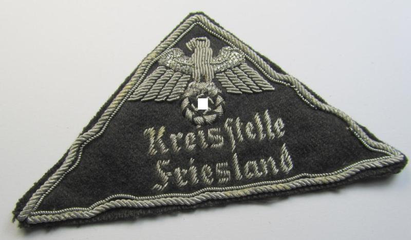 Stunning, German Red Cross (ie. 'Deutsches Rotes Kreuz' or 'DRK') greyish-coloured- and/or triangular-shaped and neatly hand-embroidered (ie. typically officers'-pattern!) arm-eagle entitled: 'Kreisstelle Friesland'