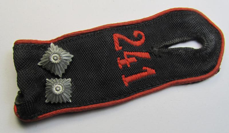 Moderately worn - albeit regrettably single! - bright-red-piped so-called: 'Allgemeine-HJ'-shoulderstrap as intended for an: 'HJ-Scharführer' who served within the 'Bann 241' (241 = 'Bann Oberbergisch' situated in the 'Gebiet West-Mittelrhein')