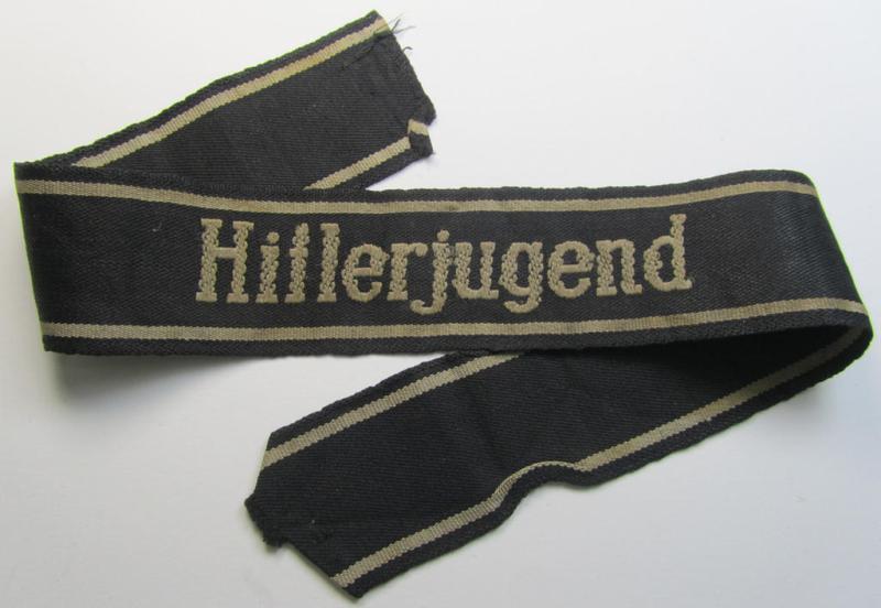 Stunning - and extremely rarely encountered! - Waffen-SS 1943/44-pattern cuff-title (ie. 'Ärmelstreifen') as was intended for a member serving within the: 12. SS-Panzer-Division 'Hitlerjugend'