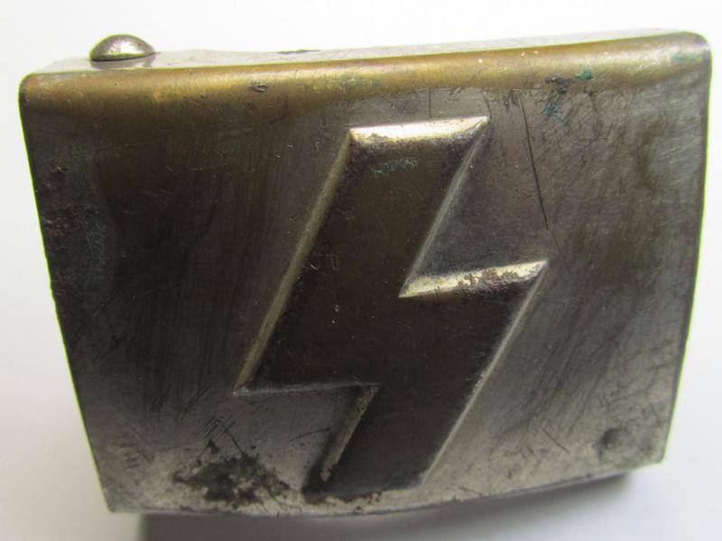 Attractive, DJ (ie. 'Deutsches Jungvolk') silver-coloured- (ie. typical nickle-chromed) belt-buckle (ie. 'Koppelschloss') being a clearly maker- (ie. 'RzM M4/60'-) marked example that comes in a moderately used- ie. worn, condition