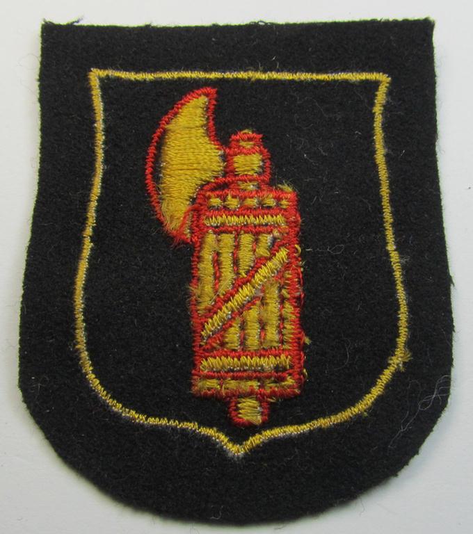 Neat, Waffen-SS, machine-embroidered armshield as was specifically intended for usage by soldiers (ie. NCOs) of the: '29. SS Waffen-Grenadier Division' ('Italienische Nr. 1' or: 'Legione SS Italiana')