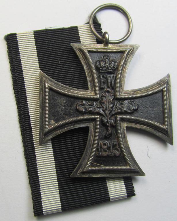 Attractive, WWI-period: 'Eisernes Kreuz II. Klasse' (or: iron cross second class) being a non-maker-marked example that comes together with its shortened & confectioned ribbon (ie. 'Bandabschnitt')