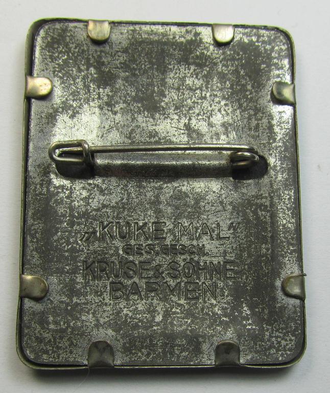 Commemorative - tin- (ie. linnen-) based 'tinnie' being a maker- (ie. 'Kruse & Söhne'-) marked example depicting a 'sunburst' with swastika and text that reads: 'Kundgebung Sängergau Westmark - Saarbrücken 1936'