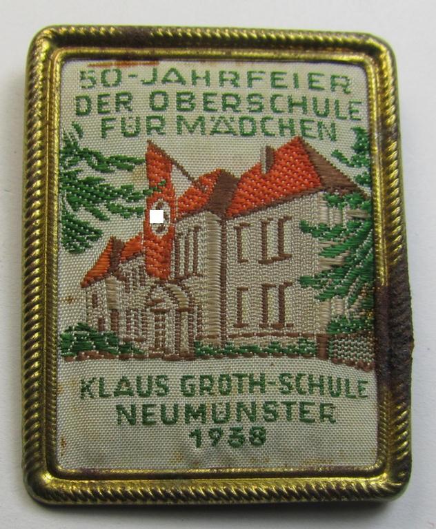 Commemorative - tin- (ie. linnen-) based 'tinnie' being a maker- (ie. 'Dr. R.Morisse'-) marked example depicting a building with swastika-flag and text that reads: '50. Jahrfeier der Oberschule für Mädchen - Klaus Groth-Schule - Neumünster - 1938'
