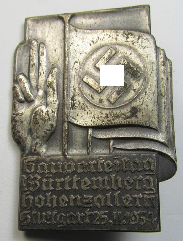 Commemorative (zinc- ie. 'Feinzink'-based) N.S.D.A.P.-related 'tinnie', being a non-maker marked example depicting an 'oath-taking hand' and swastika-flag and text: 'Gauparteitag Württemberg Hohenzollern - Stuttgart - 25.II.1934'