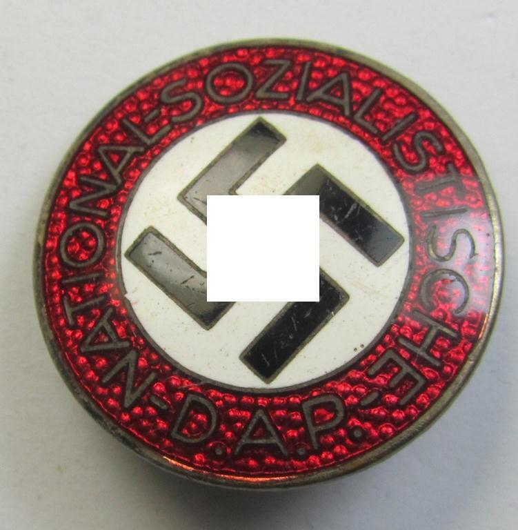 Attractive - bright-red-coloured and nicely preserved! - 'N.S.D.A.P.'-membership-pin- ie. party-badge (or: 'Parteiabzeichen') which is maker-marked on the back with the makers'-designation: 'RzM' and/or: 'M1/110'
