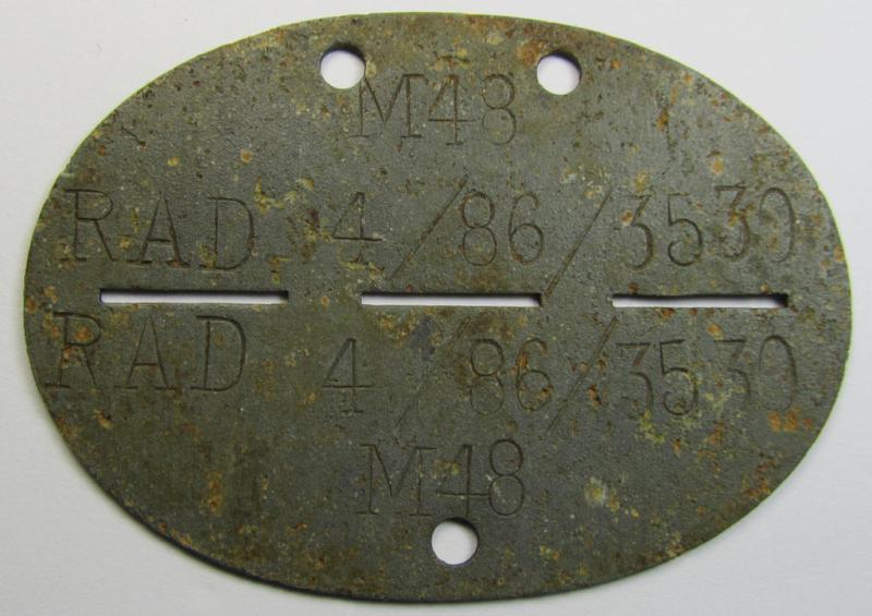 Neat - and fairly unusually found! - RAD (ie. 'Reichsarbeitsdienst') ID-disc being a typical greyish-coloured and zinc-based example bearing the stamped text ie. unit-designation that reads: 'RAD 4/86/3530 M48'