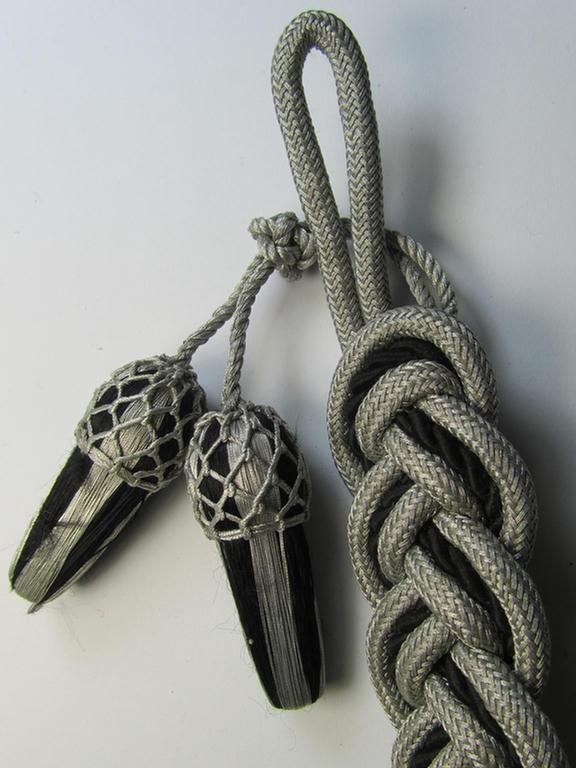 Unusual - never before seen and presumably TR-period - 'Schützenschnur für Gewehrschützen' (ie. shooting-lanyard) being a silver- and black-coloured twisted example that shows two firmly attached 'rank-nuts'