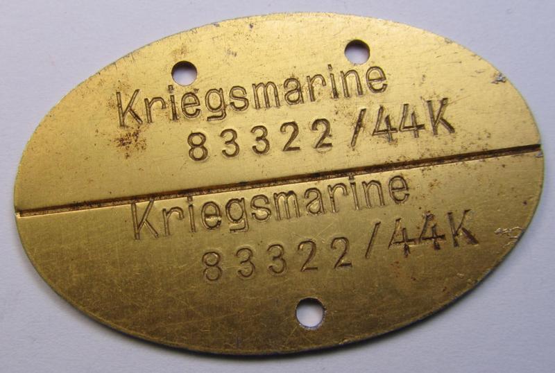 Later-war- (albeit 'standard-issue'-) pattern, WH (Kriegsmarine) typical aluminium-based- and/or bright golden-bronze toned ID-disc (ie. 'Erkennungsmarke') bearing the engraved coded numeral (ie. text) that reads: 'Kriegsmarine 83322/44K'