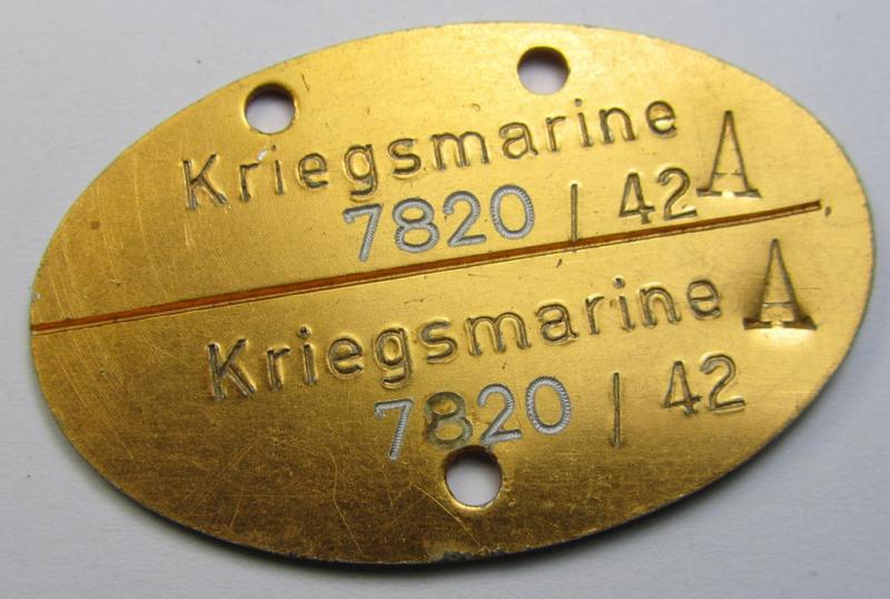 Mid-war- (albeit 'standard-issue'-) pattern, WH (Kriegsmarine) typical aluminium-based- and/or bright golden-bronze toned ID-disc (ie. 'Erkennungsmarke') bearing the engraved coded numeral (ie. text) that reads: 'Kriegsmarine 7820/42'