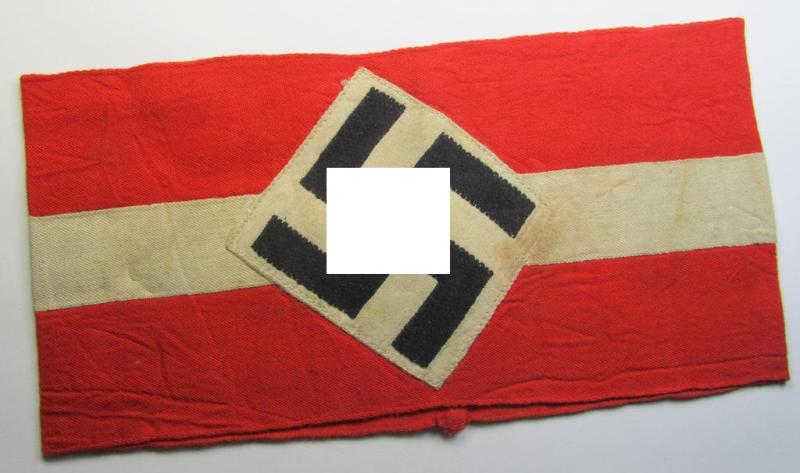 Attractive - and nowadays scarcely found! - 'standard'- (ie. entirely woven) pattern, bright-red-coloured HJ- (ie. 'Hitlerjugend'-) related armband (ie. 'Armbinde') being a moderately worn- ie. used example that regrettably misses its 'RzM'-etiket