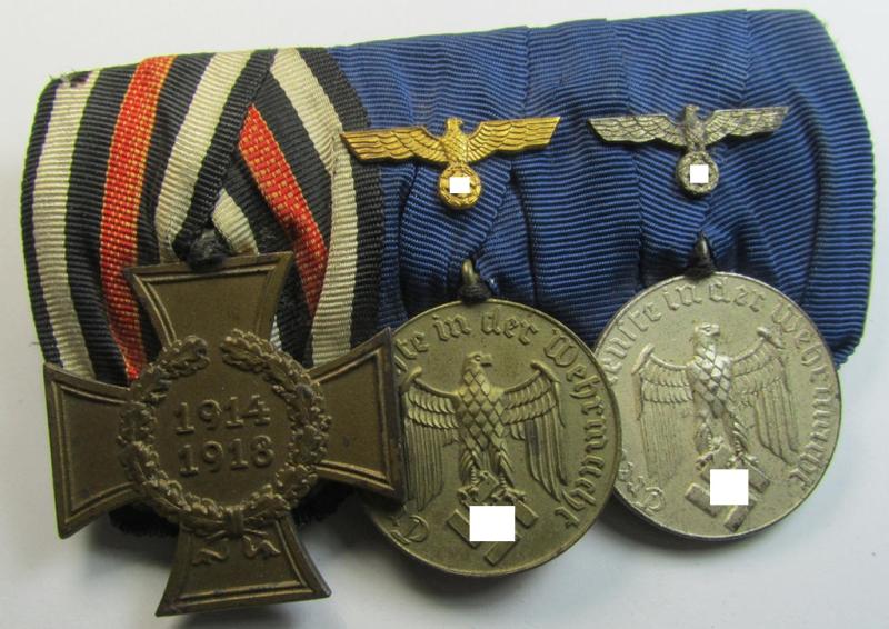 Attractive, 3-pieced medal-bar (ie. 'Ordenspange') showing resp. a WWI-period: 'FKK 1914-18 ohne Schw.' and two WWII-period: WH (Heeres or KM) so-called: 'Dienstauszeichnungen für 4 u. 12 Jahre Treue Dienste'