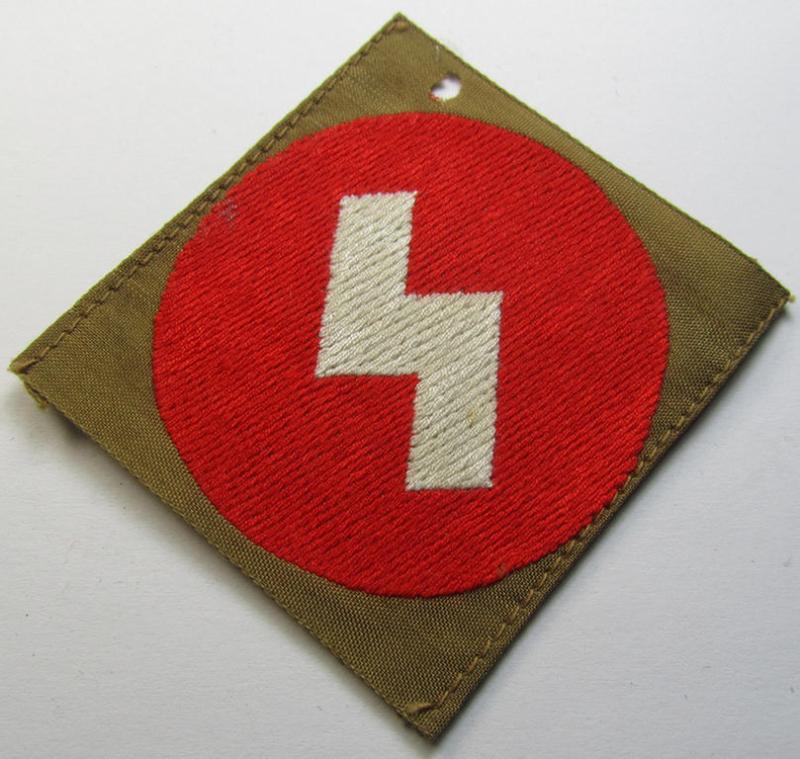 Attractive, DJ (ie. 'Deutsches Jungvolk') arm-badge as was specifically intended for usage by a member who served within the: 'Oberbann 1' (being a 'virtually mint- ie. unissued' example that is void of an 'RzM'-etiket)