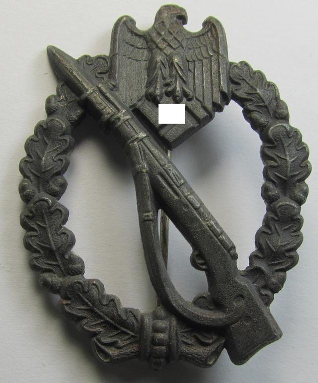 'Infanterie-Sturmabzeichen in Silber' (or: silver-class IAB) being a clearly maker- (ie. 'GWL'-) marked, zinc- (ie. 'Feinzink'-) version ie. molded-'variant' as was procuded by the: 'Gebrüder Wegerhoff'-company