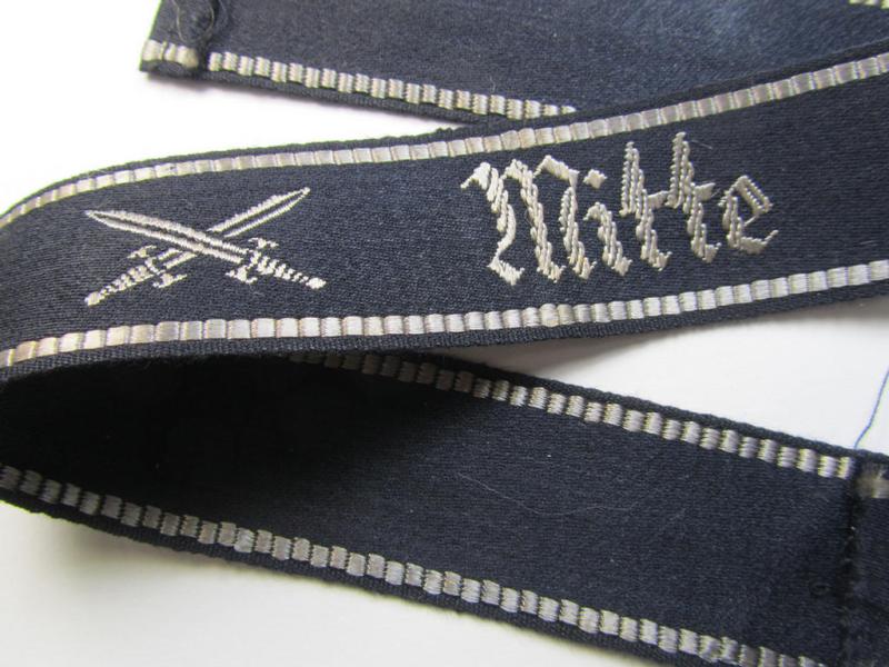 Darker-blue-coloured (and neatly 'BeVo'-woven) so-called: 'NS-RKB' (or: 'Nationalsocialistische Reichs Krieger Bund') cuff-title (ie. 'Ärmelstreifen') entitled: 'Mitte' and that comes in a never used- ie. 'virtually mint', condition
