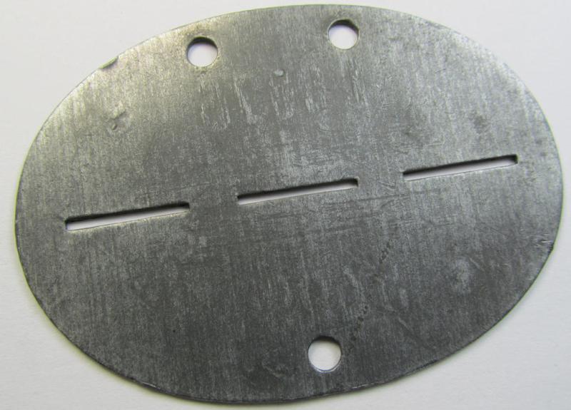 Neat, typical zinc-based WH (Heeres) ID-disc (ie. 'Erkennungsmarke') bearing the clearly stamped unit-designation that reads: 'San.Ers.-u.Ausb.-Abt. 12' and that comes as issued and/or worn