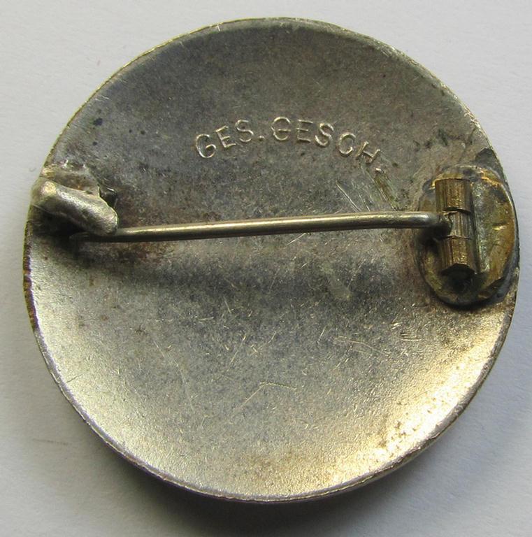 Attractive example of a DRK (ie. 'Deutsches Rotes Kreuz' or German Red Cross) nurses'-badge as was intended for a: 'Helferin' being a non-maker-marked example (showing a: 'Ges.Gesch.'-designation) that comes in a fully untouched condition