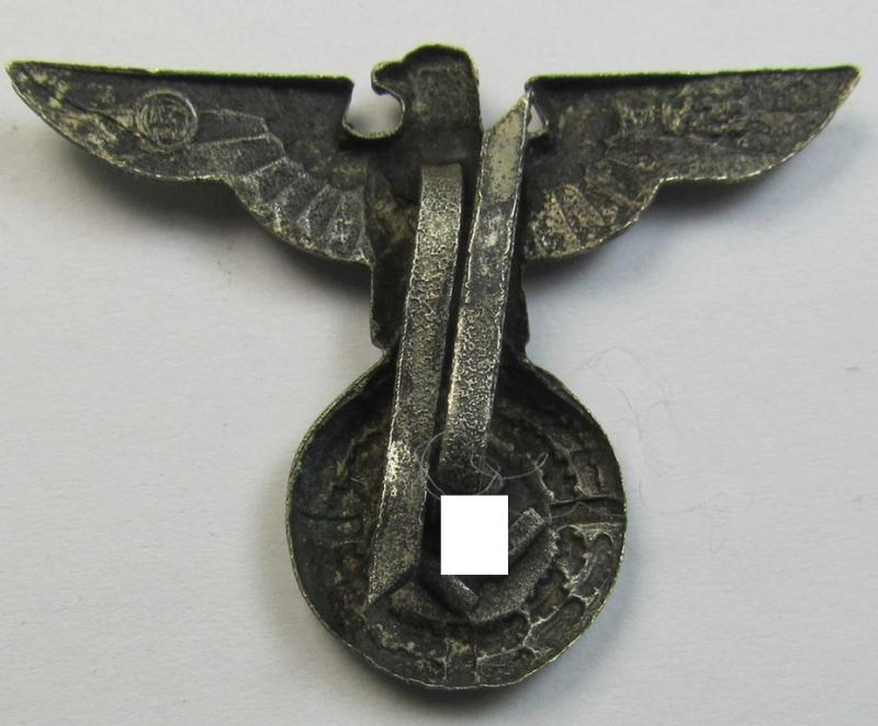 Silver-toned - and I deem 'Buntmetall'-based - early-pattern, SS- o. SA-type, political-style visor- (ie. 'Schirmmützen'-) cap-eagle being a clearly maker- (ie. 'RzM M1/25'-) marked example that comes in a used- ie. carefully cap-removed-, condition