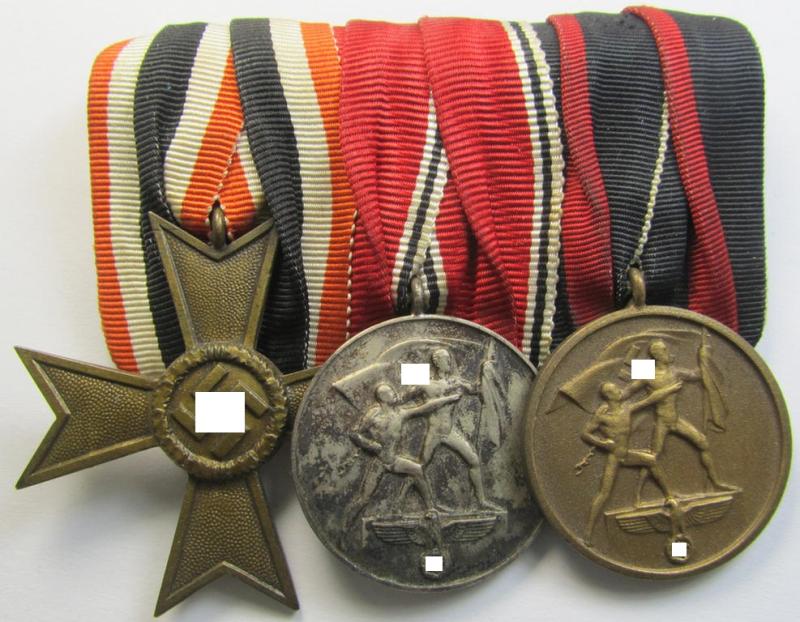 3-pieced medal-bar (ie. 'Ordenspange') showing resp. a: 'KvK 2. Kl. ohne Schw.' (or: War Merits' Cross second class without swords) and two (Austrian- and a Czech) 'Anschluss'- (ie. occupation-) medals: '1 März 1938' (ie. '1 October 1938')