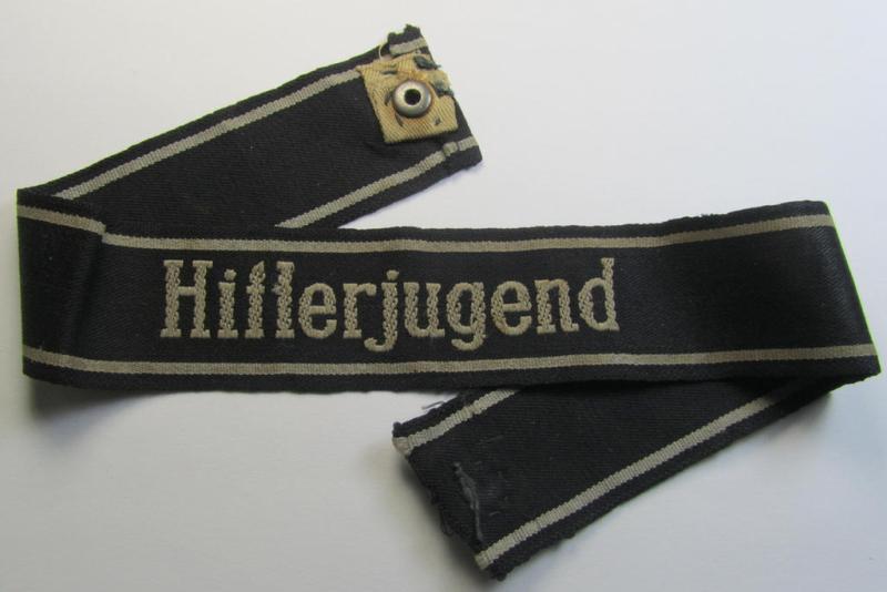 Stunning - and actually extremely rarely encountered! - Waffen-SS 1943/44-pattern cuff-title (ie. 'Ärmelstreifen') as was intended for a member serving within the: 12. SS-Panzer-Division 'Hitlerjugend'