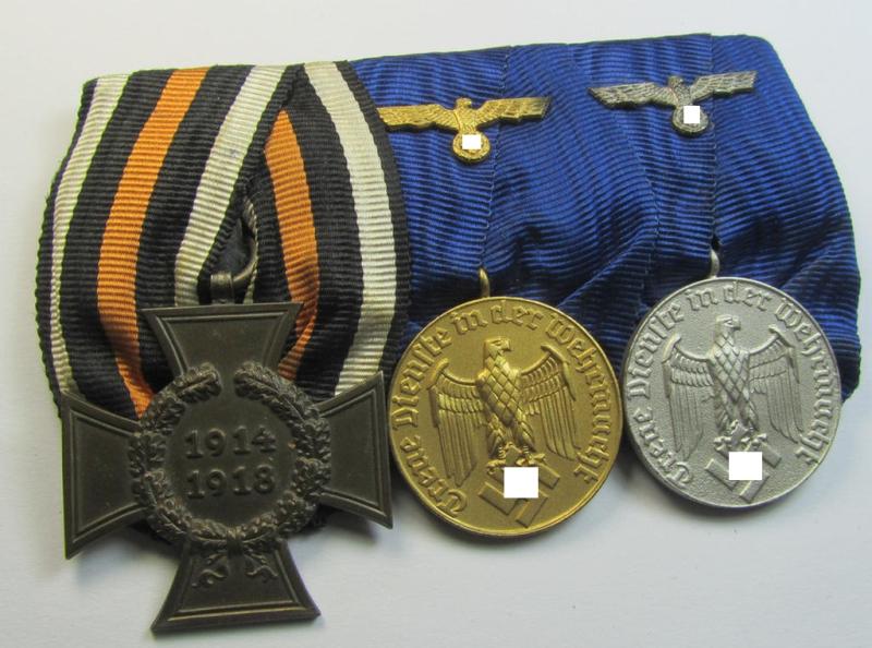 Superb, 3-pieced medal-bar (ie. 'Ordenspange') showing resp. a WWI-period: 'FKK 1914-18 ohne Schw.' and two WWII-period: WH (Heeres or KM) so-called: 'Dienstauszeichnungen für 12 u. 4 Jahre Treue Dienste'