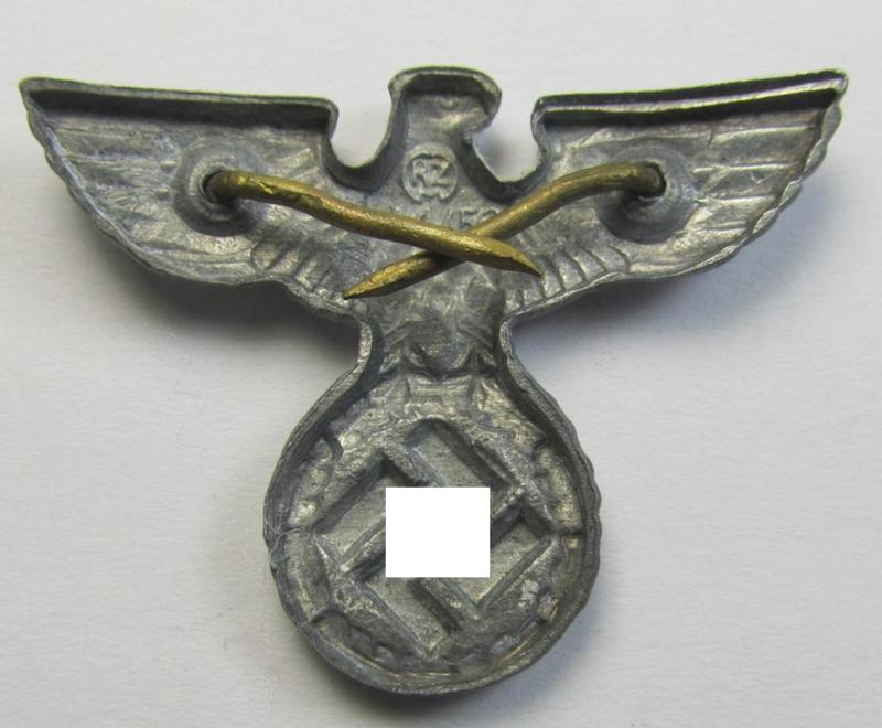 Neat - and hardly used - example of a silverish-grey-coloured- and/or: zinc- (ie. 'Feinzink'-) based (political-style) visor- (ie. 'Schirmmützen'-) cap-eagle being a detailed example showing the makers'-designation: 'RzM M1/53'
