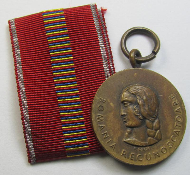 Romanian medal: 'Kreuzzug gegen den Kommunismus' (or in Romanian language: 'Medalia - Crusiada Impotriva Communismului') that comes together with its original (and never confectioned- ie. 'virtually mint') ribbon as issued