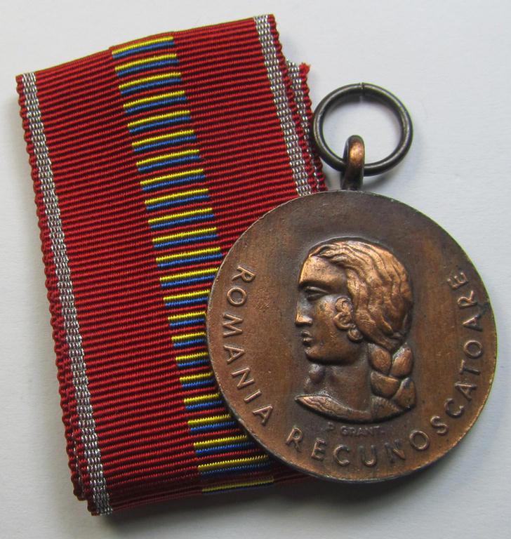 Romanian medal: 'Kreuzzug gegen den Kommunismus' (or in Romanian language: 'Medalia - Crusiada Impotriva Communismului') that comes together with its original (and never confectioned- ie. 'virtually mint') ribbon as issued