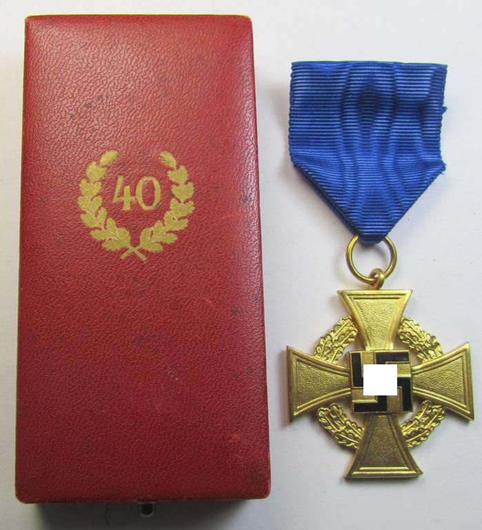 Attractive, 'Treuedienst Ehrenzeichen 1. Klasse' being a (typical) non-maker-marked example that came mounted onto its original ribbon (ie. 'Bandabschnitt') and that comes stored in its non-maker-marked etui as issued and/or found