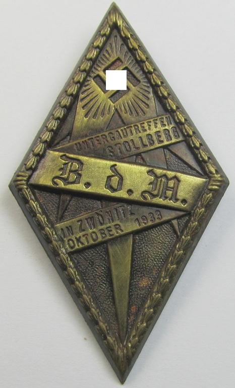 Attractive - and luxuriously styled! - BDM- (ie. 'Bund Deutscher Mädel'-) related day-badge (ie. 'tinnie') being a golden-bronze-toned- and zinc-based example as issued to commemorate the: 'Untergautreffen Stollberg - B.D.M. Zwönitz - Oktober 1933'