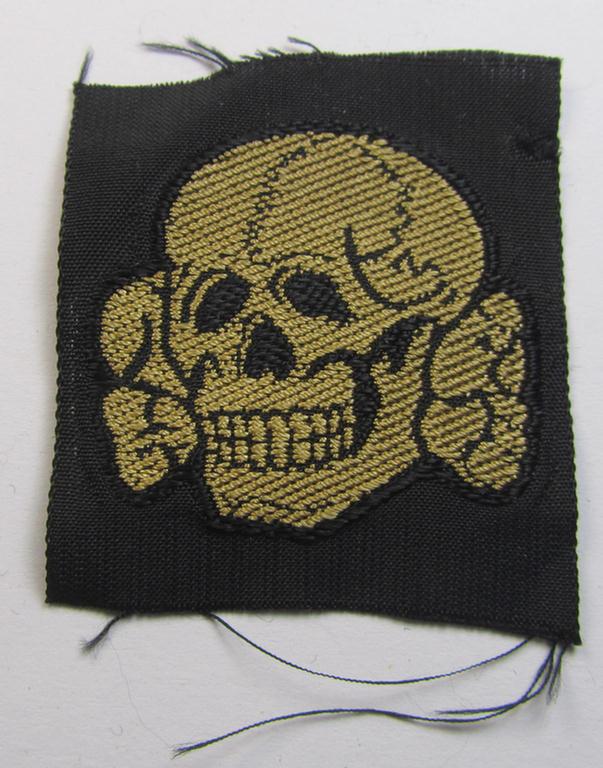 Attractive - and 'virtually mint- ie. unissued'! - example of a Waffen-SS cap-skull (being of the larger-sized model as was executed in neat 'BeVo'-weave pattern and being of the 'tropical'-version- ie. being a golden-yellow-coloured example)