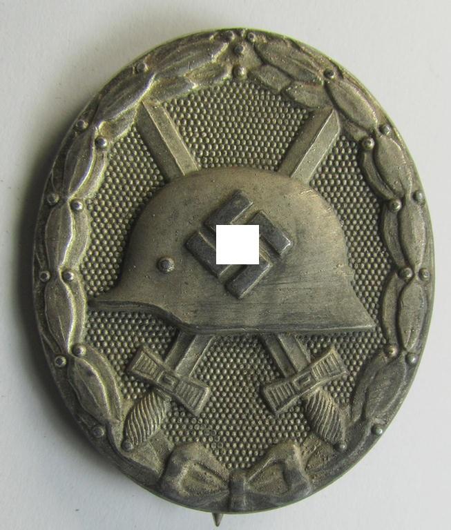 Attractive - and neatly maker- (ie. '127'-) marked! - example of a silver-class wound-badge (or: 'Verwundeten-Abzeichen in Silber') as was produced by the maker: 'Moritz Hausch A.G.'