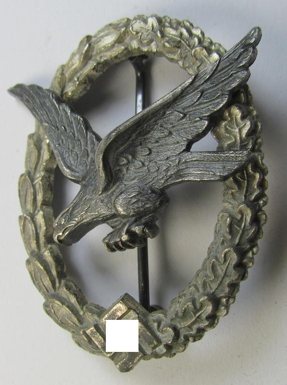 Superb, WH (Luftwaffe) 'Fliegerschützen-Abzeichen ohne Blitzbündel' being a maker- (ie. 'Wilh. Deumer'-) marked and typically zinc- (ie. 'Feinzink'-) based example that comes as issued and/or moderately worn