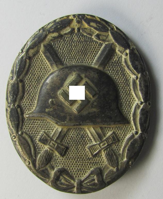 Attractive, 'Verwundeten Abzeichen in Silber' (or: silver-class wound-badge) being a neatly dual maker- (ie. '100'- and: 'L/55'-) marked example as was produced by the: 'Rudolf Wächtler u. Lange'-company
