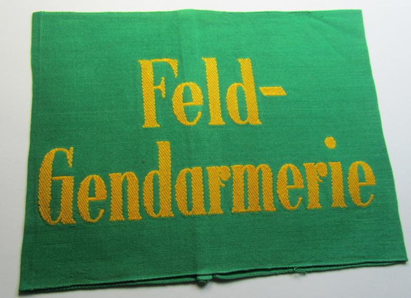 Attractive - and fairly rarely encountered! - Wehrmacht-related, bright-green-coloured and/or linnen-based armband entitled: 'Feldgendarmerie' (as was specifically intended for usage by the staff of the notorious 'Feldgendarmerie-Truppen')