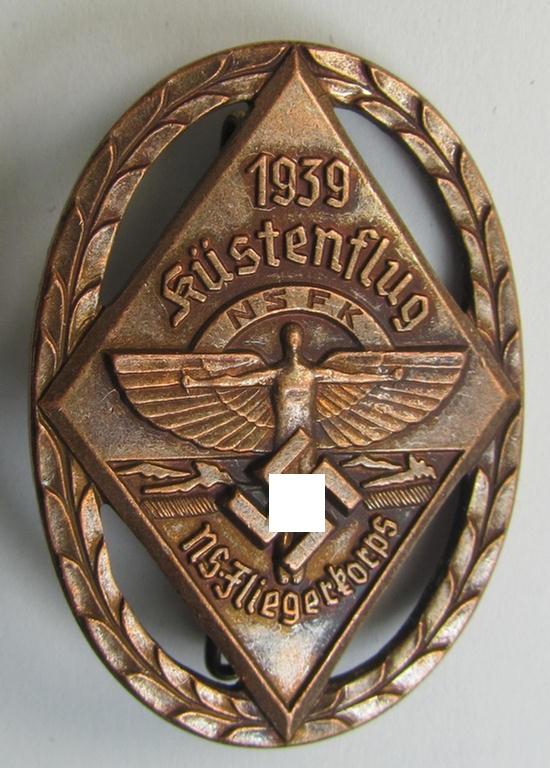 Superb, copper-bronze-toned N.S.F.K.-related day-badge (ie. 'tinnie') being a non-maker-marked example as was issued to commemorate a specific meeting ie. national rally entitled: 'N.S.F.K. Küstenflug 1939'