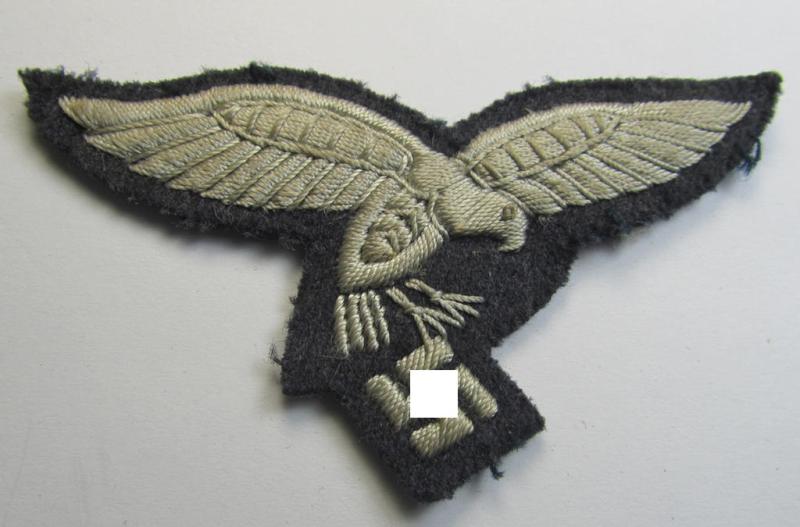 Attractive, 'Extra Qualität', WH (LW) officers'- (evt. EM- ie. NCO-) type, hand-embroidered breast-eagle (ie. 'Brustadler für Offiziere der LW') being a so-called: 'down-tailed'-example that comes in a hardly worn, condition