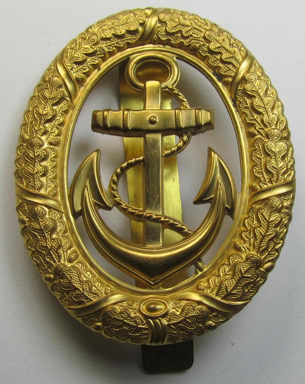 Attractive, WH (Kriegsmarine) bright-golden-toned, so-called: 'Wachoffizier-Dienstabzeichen für Offiziere der KM' (aka: 'Tagesdienstabzeichen') being a neatly maker- (ie. 'A'- or 'Assmann u. Söhne'-) marked example
