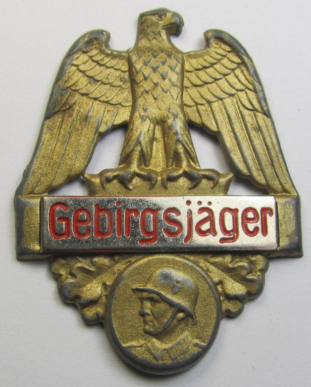 Commemorative, WHW- (ie. 'Winterhilfswerke'-) related 'tinnie' being a non-maker marked example depicting an eagle-device (coupled with steelhelmet) and showing the text: 'Gebirgsjäger'