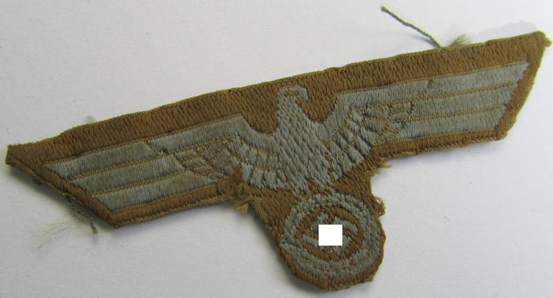 Attractive, WH (Heeres) 'tropical-issued' (ie. DAK or: 'Deutsches Afrika Korps'-related-) cap-eagle being an example as was executed in neat so-called: 'BeVo'-weave style (and that comes in a clearly used- and pre-confectioned- ie. once cap-attached