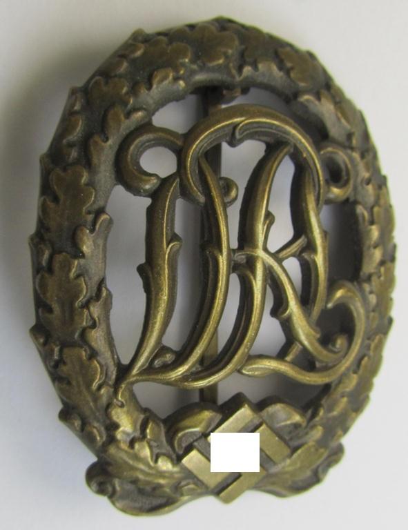 Attractive - and I deem just moderately worn- ie. used! - 'Reichssportabzeichen DRL in Bronze' (or: DRL sports'-badge in bronze) being an example that is nicely maker- (ie. 'Wernstein-) marked on its back