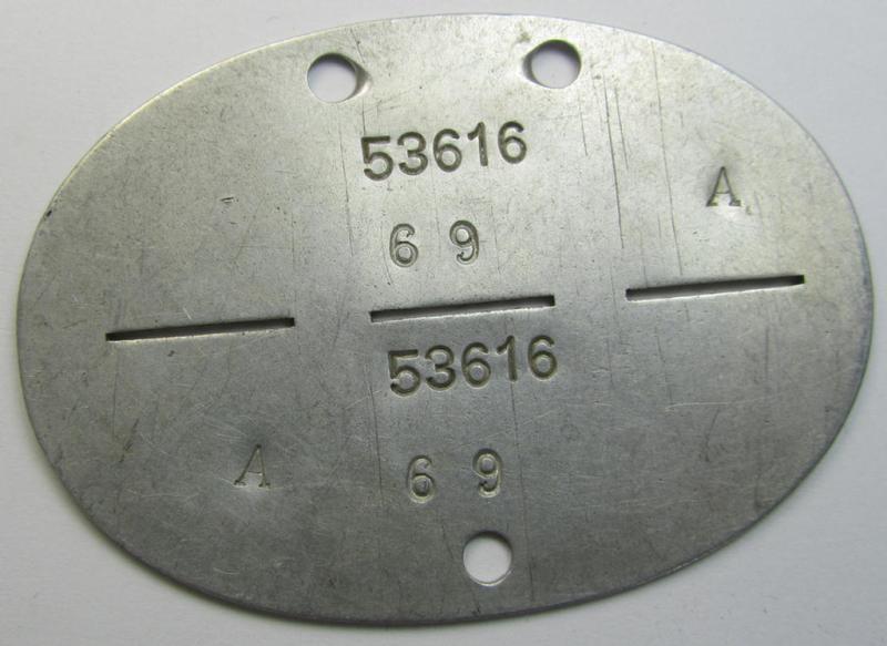Aluminium-based, WH (Luftwaffe-) ie. 'Flieger'-related ID-disc, bearing the clearly stamped- and/or: 'coded'-unit- ie. 'MOB'-designation that reads: '53616' (and as such belonging to a soldier who served within the: '13./K.Gr.z.b.V.1')