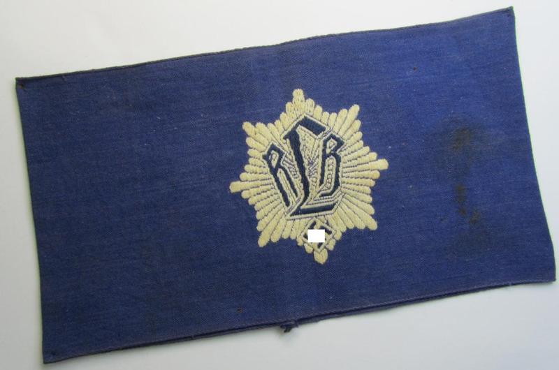 Attractive, darker-blue-coloured so-called: RLB (or: 'Reichsluftschutzbund') 'Amtsträger'-armband depicting the typical 'RLB'-logo (with lettering) and showing an interwoven 'Ges.Gesch.'-patent-pending-designation
