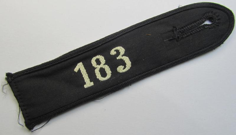 Neat - and naturally single! - black-piped 'DJ- o. Deutsches Jungvolk' shoulderstrap as was intended for usage by a: 'DJ-Mitglied' who served within the: 'Bann 183' (183 = 'Herford') and that comes with its period-attached 'RzM'-etiket