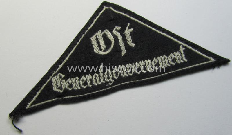 Superb - and scarcely found! - 'HJ' ('Hitlerjugend') ie. 'BDM' ('Bund Deutscher Mädel'-) district-triangle (ie. 'Gebietsdreieck') entitled: 'Ost Generalgouvernement' (being a minimally used- ie. worn example)