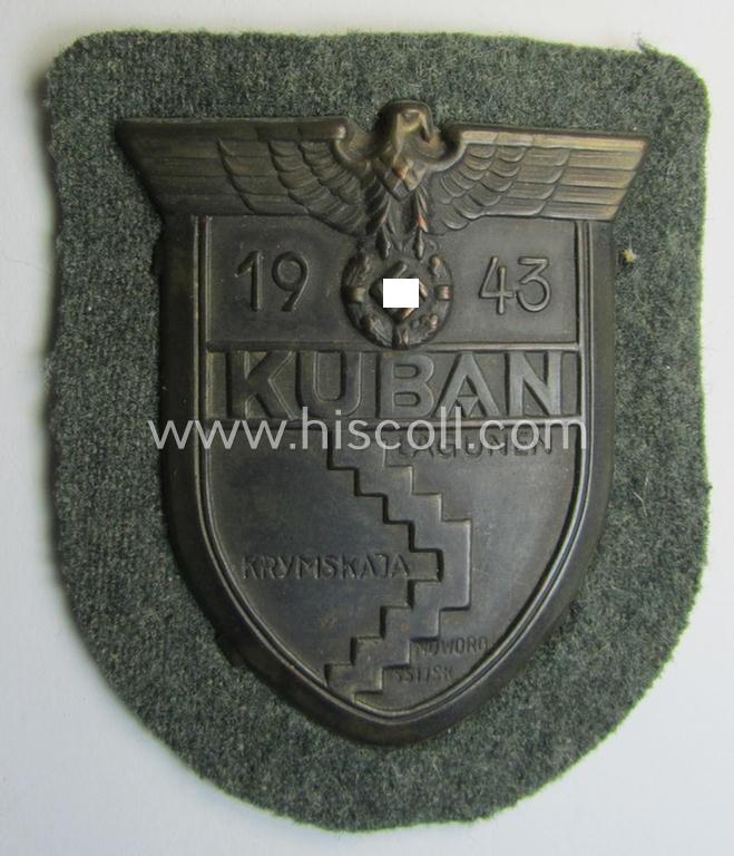 Very attractive - and actually scarcely encountered! - WH (Heeres ie. Waffen-SS) 'Kuban'-campaign-shield that comes mounted onto its original field-grey-coloured- and/or woolen-based 'backing'