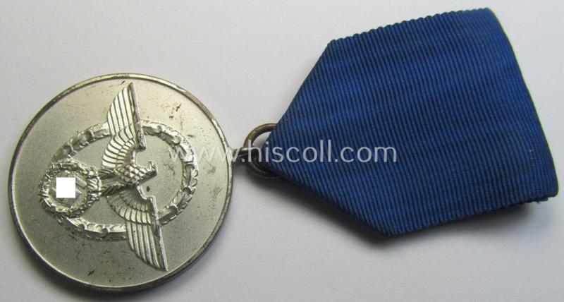 Attractive, bright-silver-toned so-called: 'Polizei-Dienstauszeichnung der 3. Stufe' (or: police loyal service medal of the 3rd class as was awarded for 8 years of service) that comes mounted on its period ribbon (ie. 'Bandabschnitt') as issued